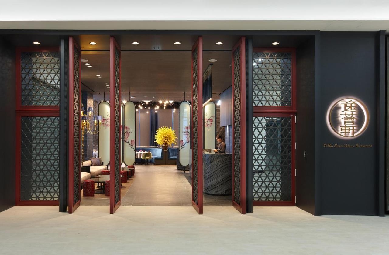 COZZI Blu Hotel Zhongli Exterior foto The entrance of the restaurant